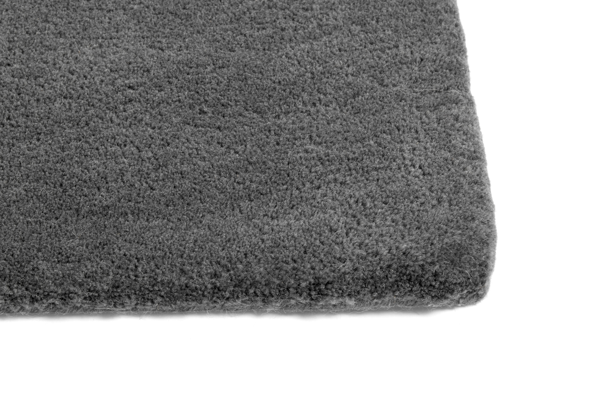 Detailaufnahme des grauen Hay Raw Rug Teppichs (300x200 cm) mit weicher Textur.