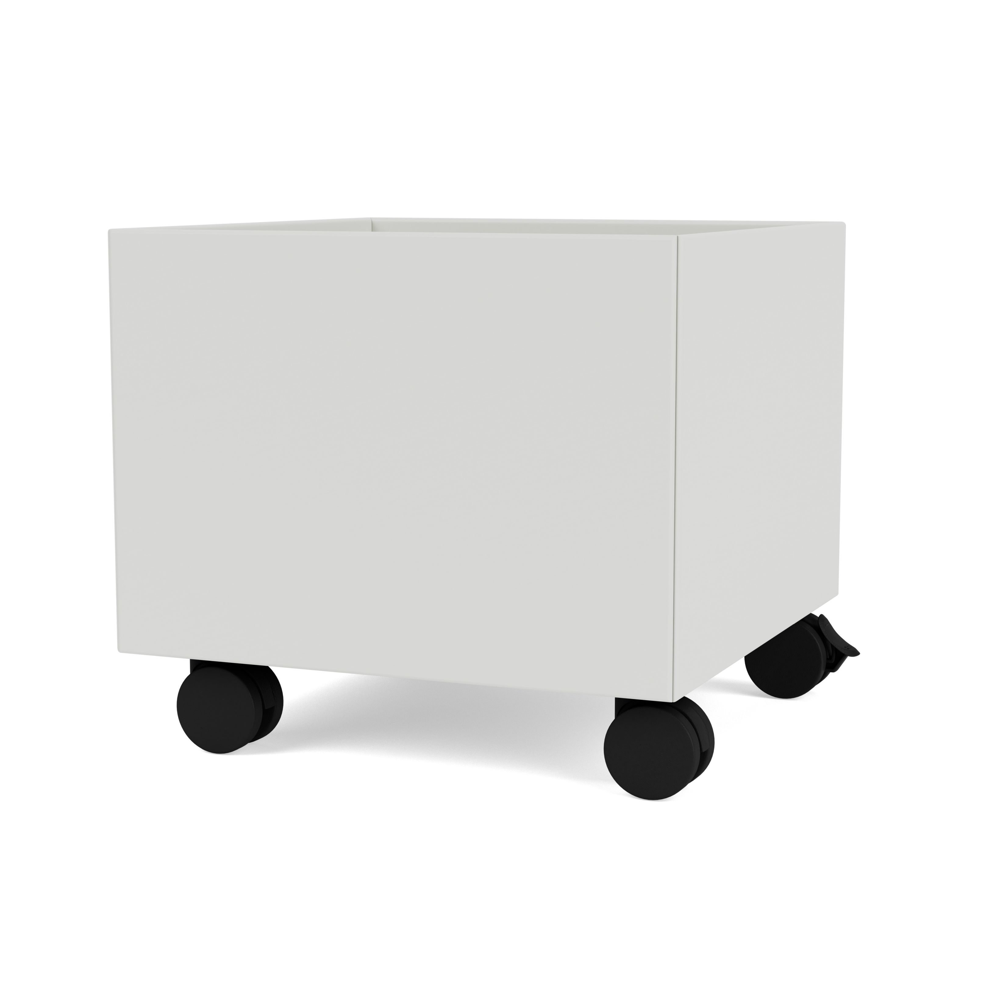 Nordische Mini Play Aufbewahrungsbox in Montana-Optik, weiße Spielzeugkiste mit schwarzen Rollen für Kinderzimmer.