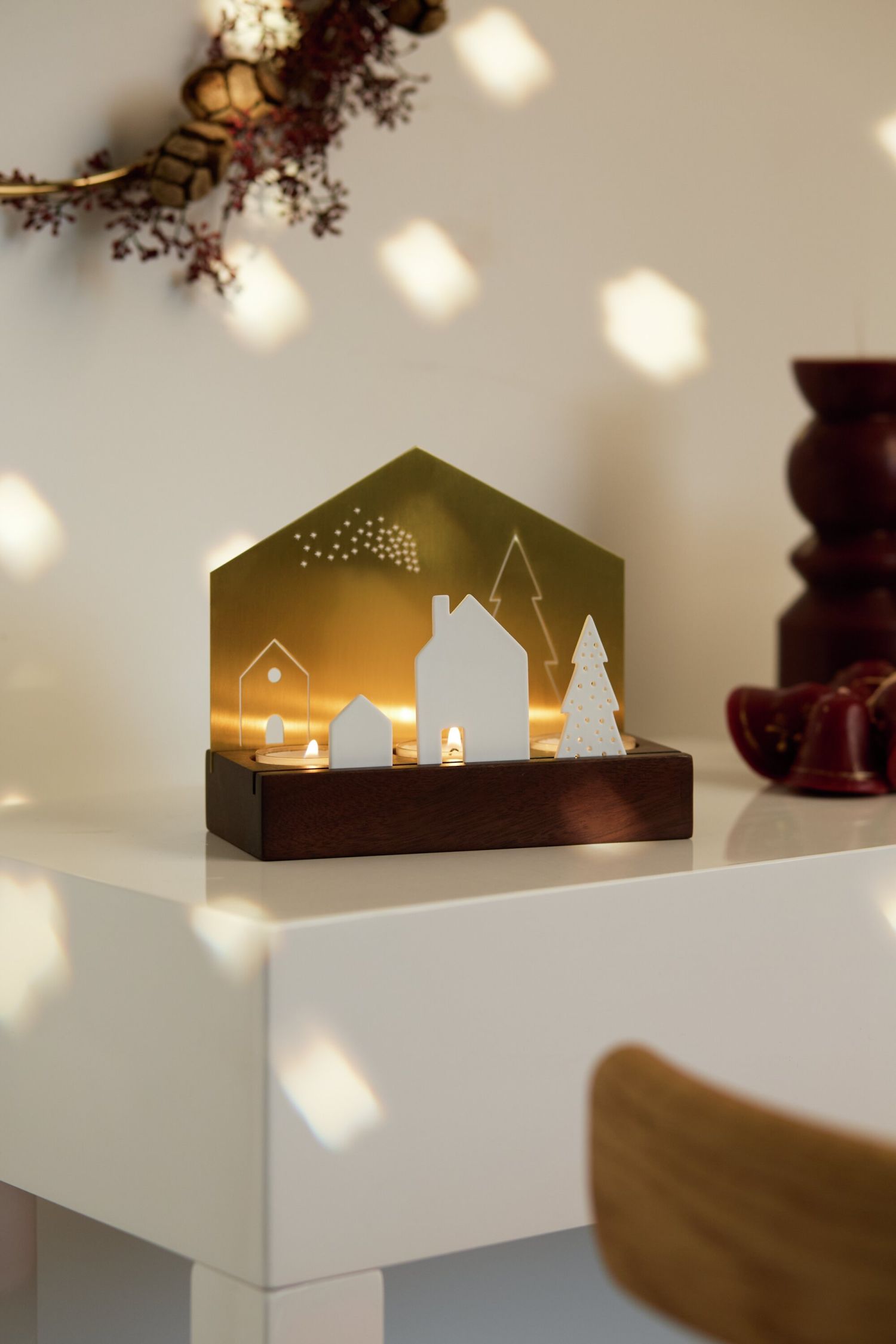 Lichtobjekt Dorf Porzellan-Metall Räder