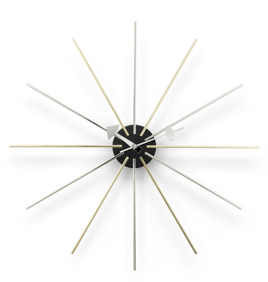 Vitra Wanduhr "Star Clock" mit goldenen und silbernen Zeigern auf schwarzem Ziffernblatt.