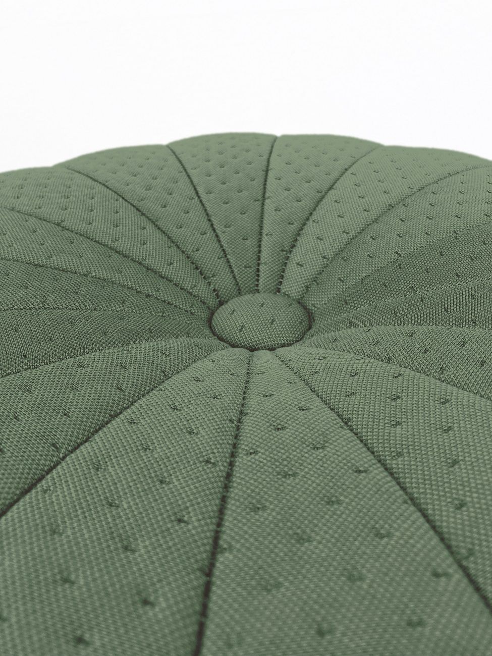 Detailaufnahme des grünen Claudie Pouf Hockers von Hartô mit Knopf und gestepptem Stoffmuster.