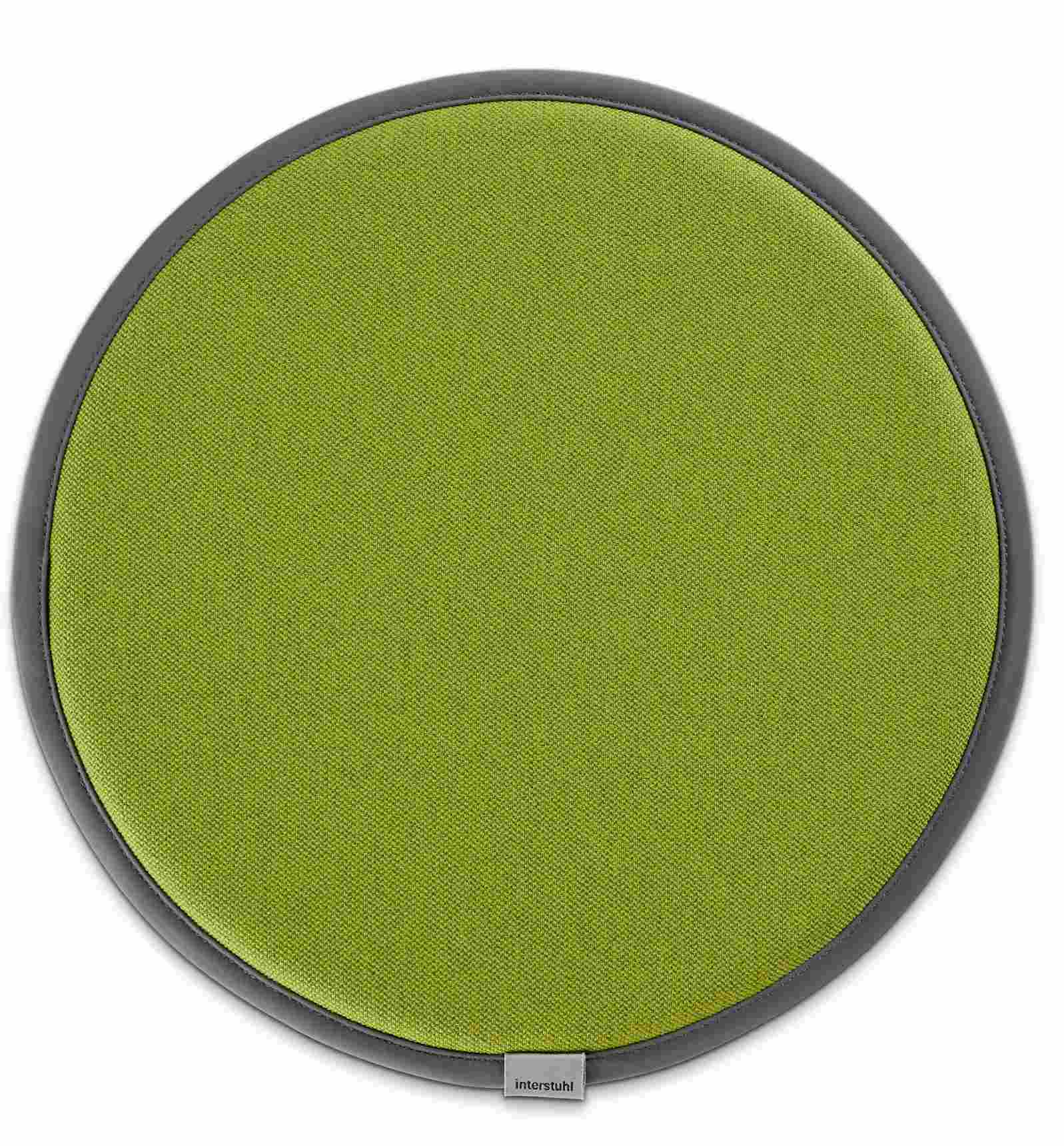 Grünes Sitzkissen für Interstuhl Up Hocker, runde Form mit grauem Rand, bequeme Sitzauflage.