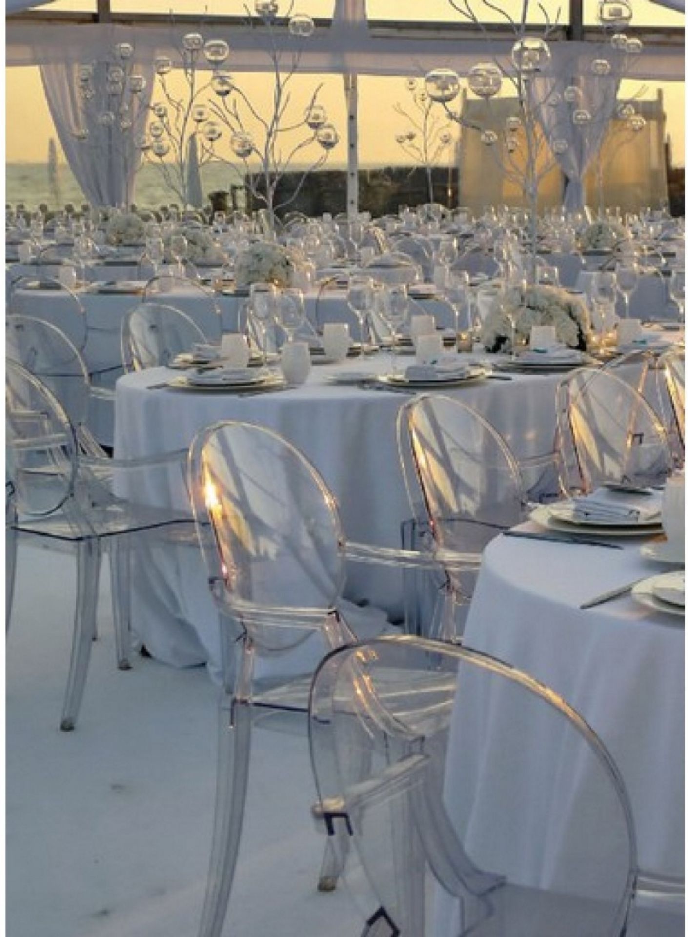 Louis Ghost Armlehnenstuhl glasklar 4-er Set  Kartell