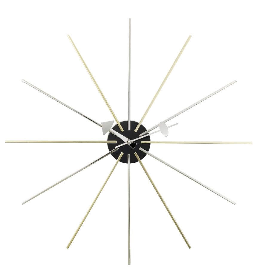 Star Clock Wanduhr von Vitra: Moderne Wanduhr mit goldenen und silbernen Strahlen.
