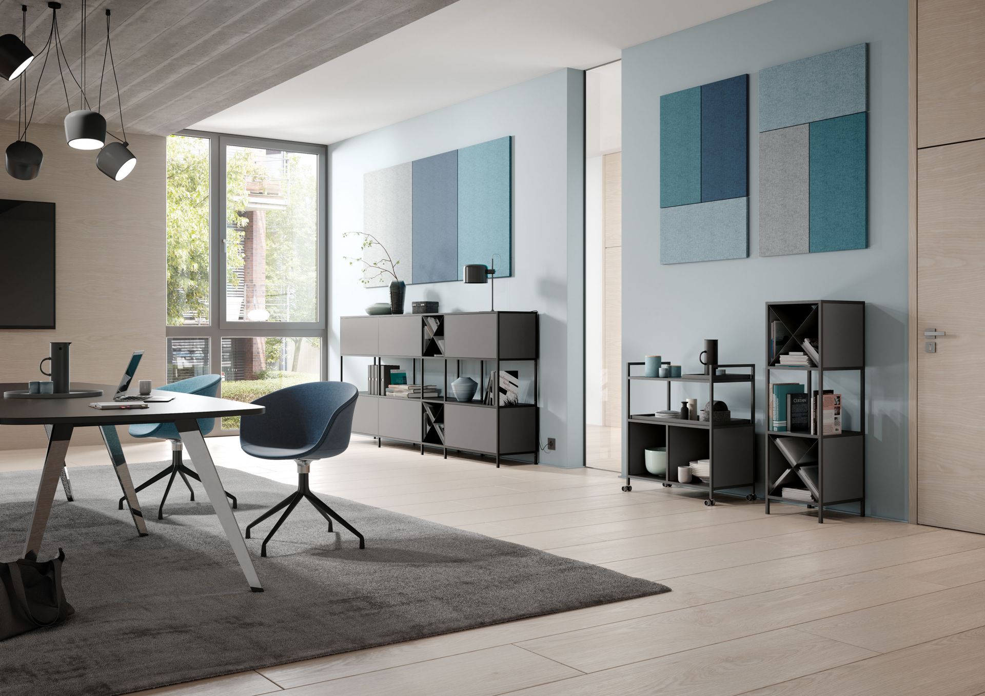 Moderner Büroraum mit Palmberg Servierwagen, Regalen und Schreibtisch in Grau und Blau.